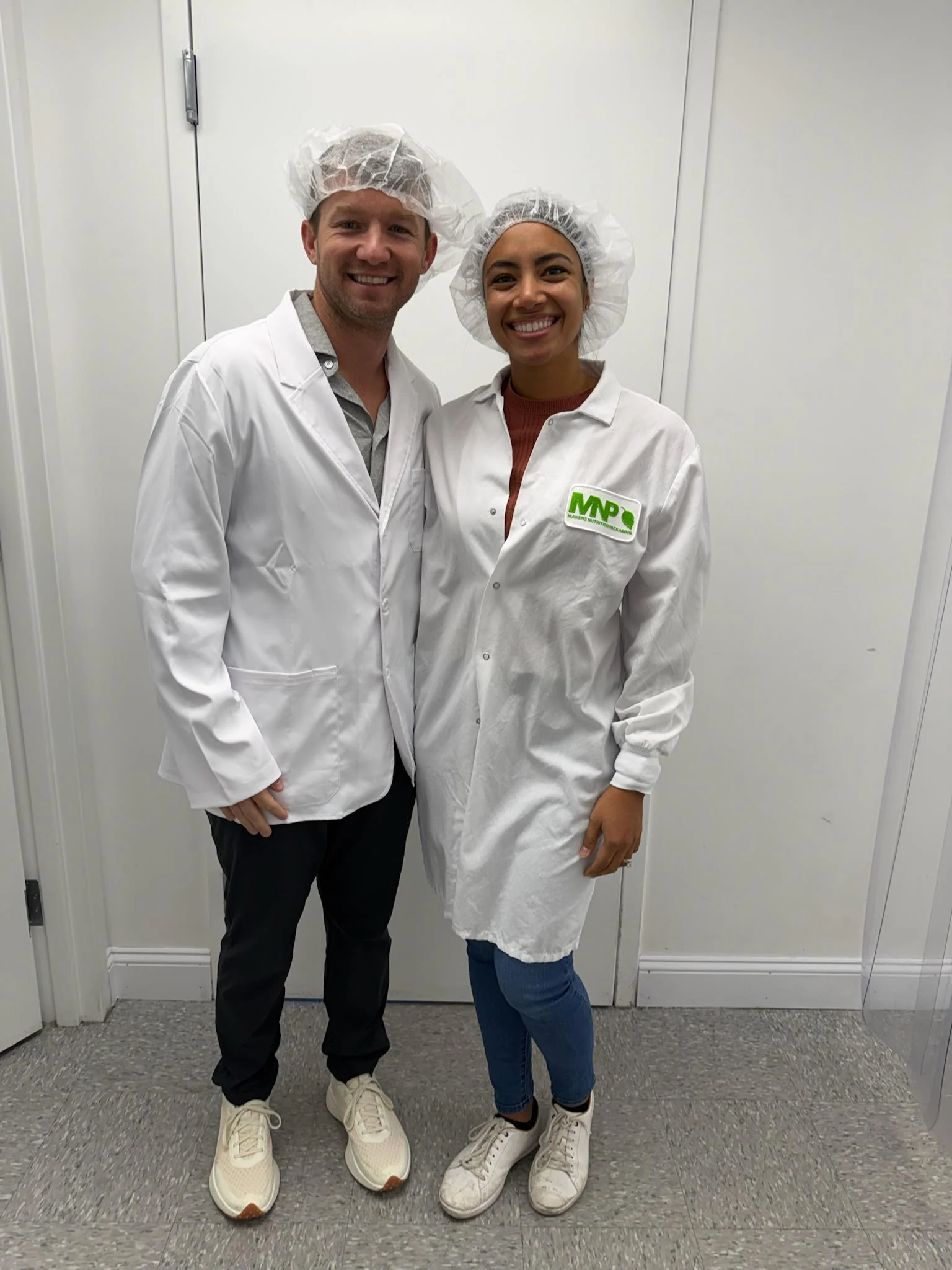 Angel and Nick, co-founders and Certified Anesthesiologist Assistants, in scrubs